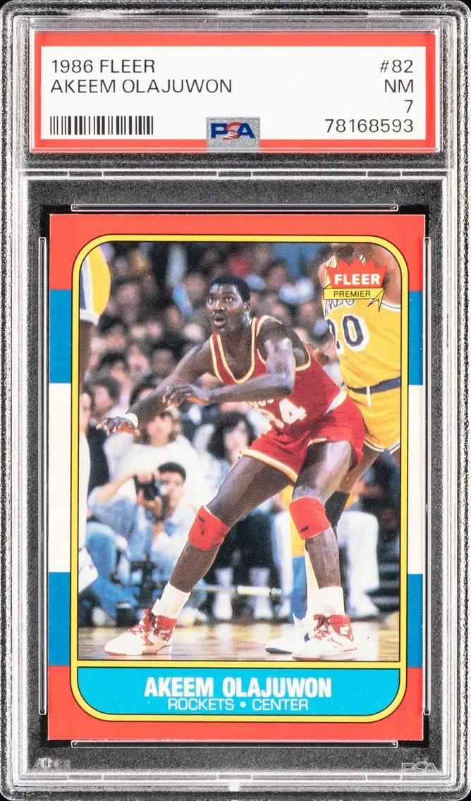 1986 #82 AKEEM OLAJUWON PSA 7 FLEER